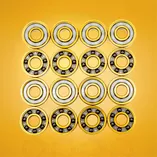 Łożyska hybrydowe złote Stelior Black Ceramic do rolek (16 szt.)